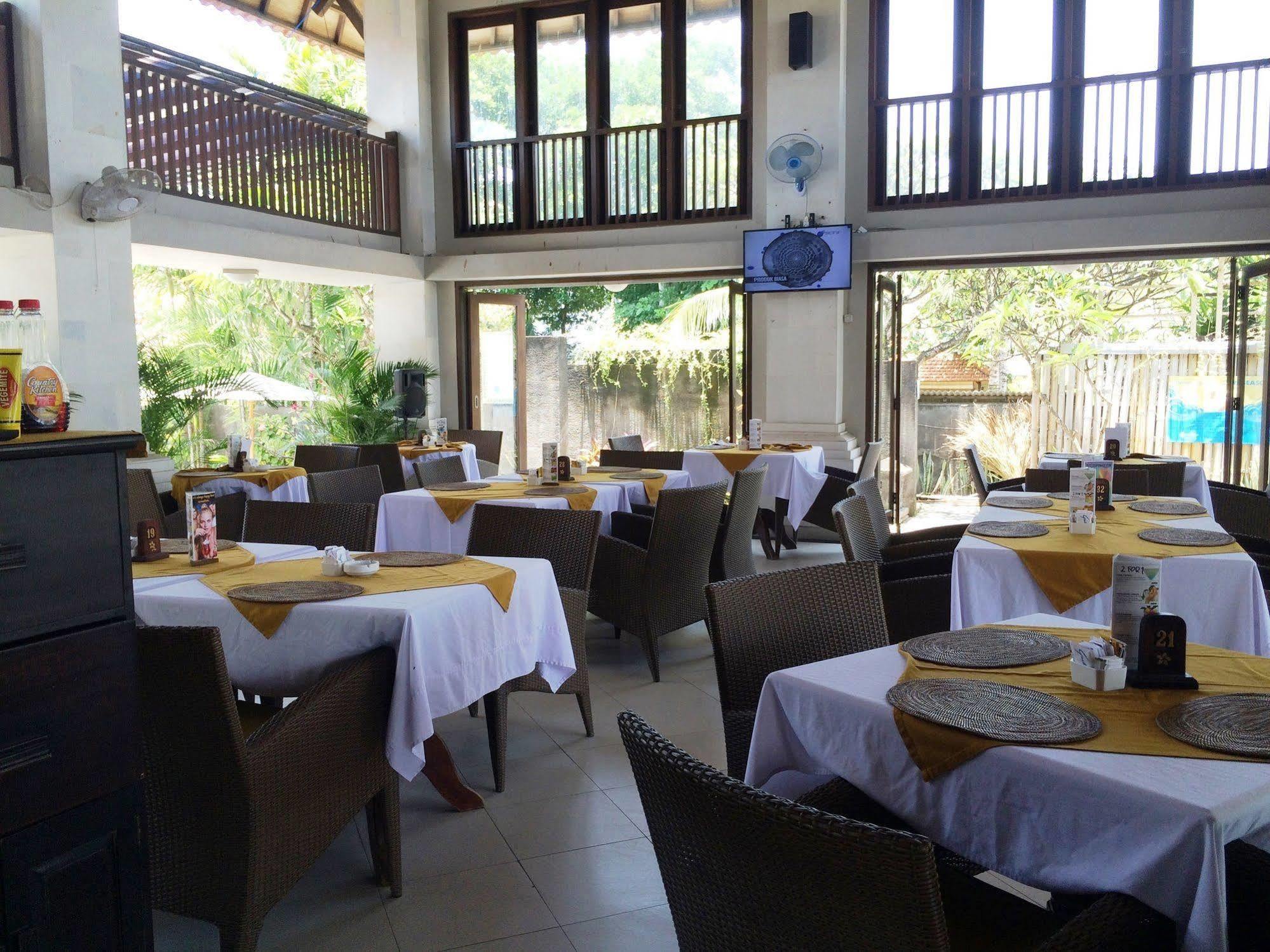 Puri Raja Hotel Legian Exterior foto
